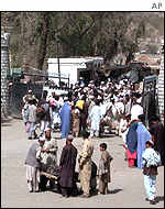Afghan refugees streaming through the border between Afghanistan and Pakistan before it closed