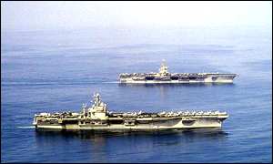 US Navy aircraft carriers USS Enterprise and USS Carl Vinson in the Arabian Gulf