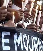Bangladeshis hold a candle-light vigil in Dhaka